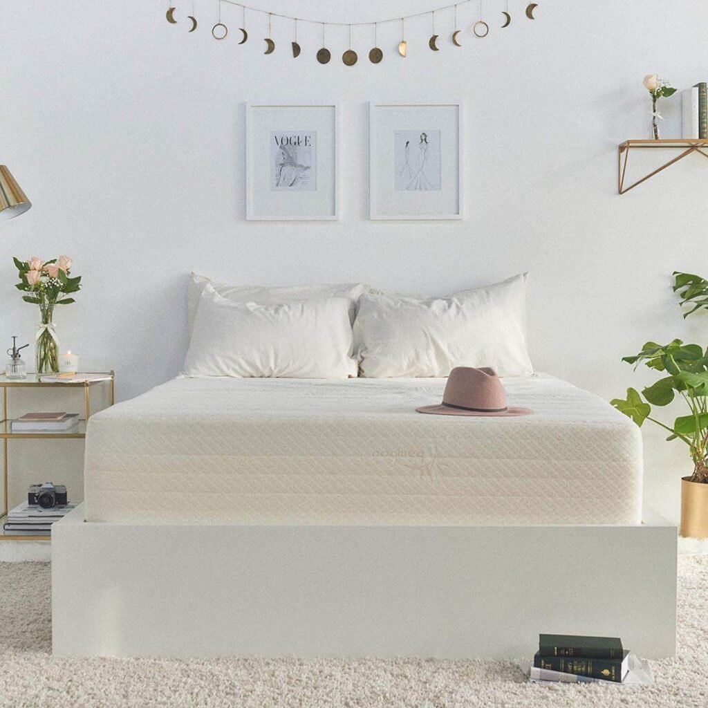 Brentwod home organic mattress pictured in calm bedroom with pink hat on bed