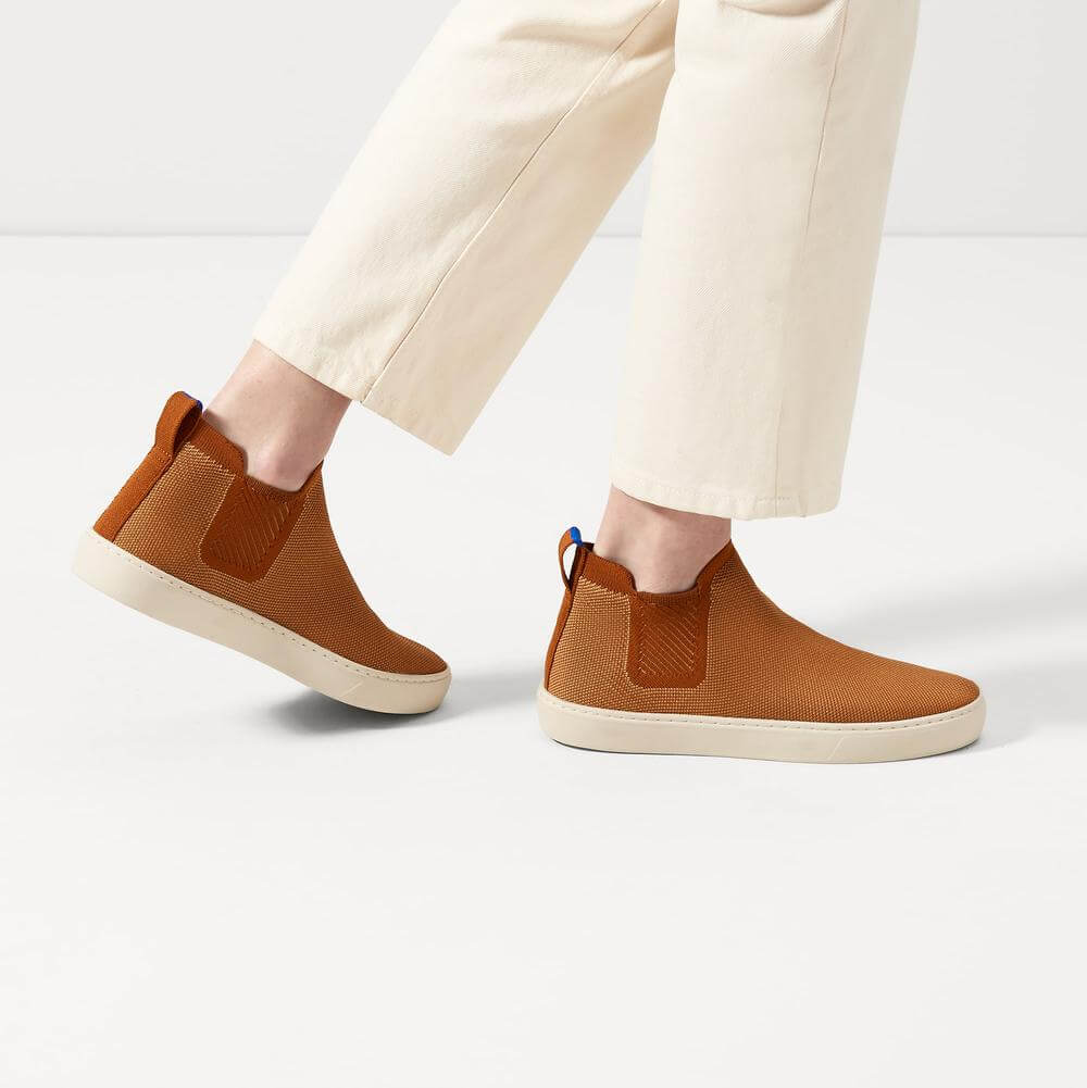 Rothys sustainable chelsea boots in orange knit