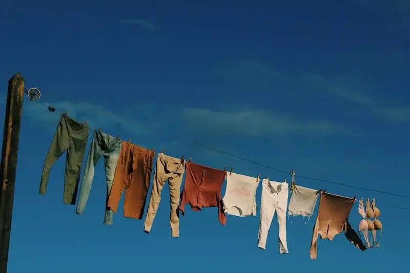 Hang clothes out to air